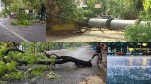 नोएडा आंधी-बारिश के बाद सड़क पर जलभराव और गिरे पेड़